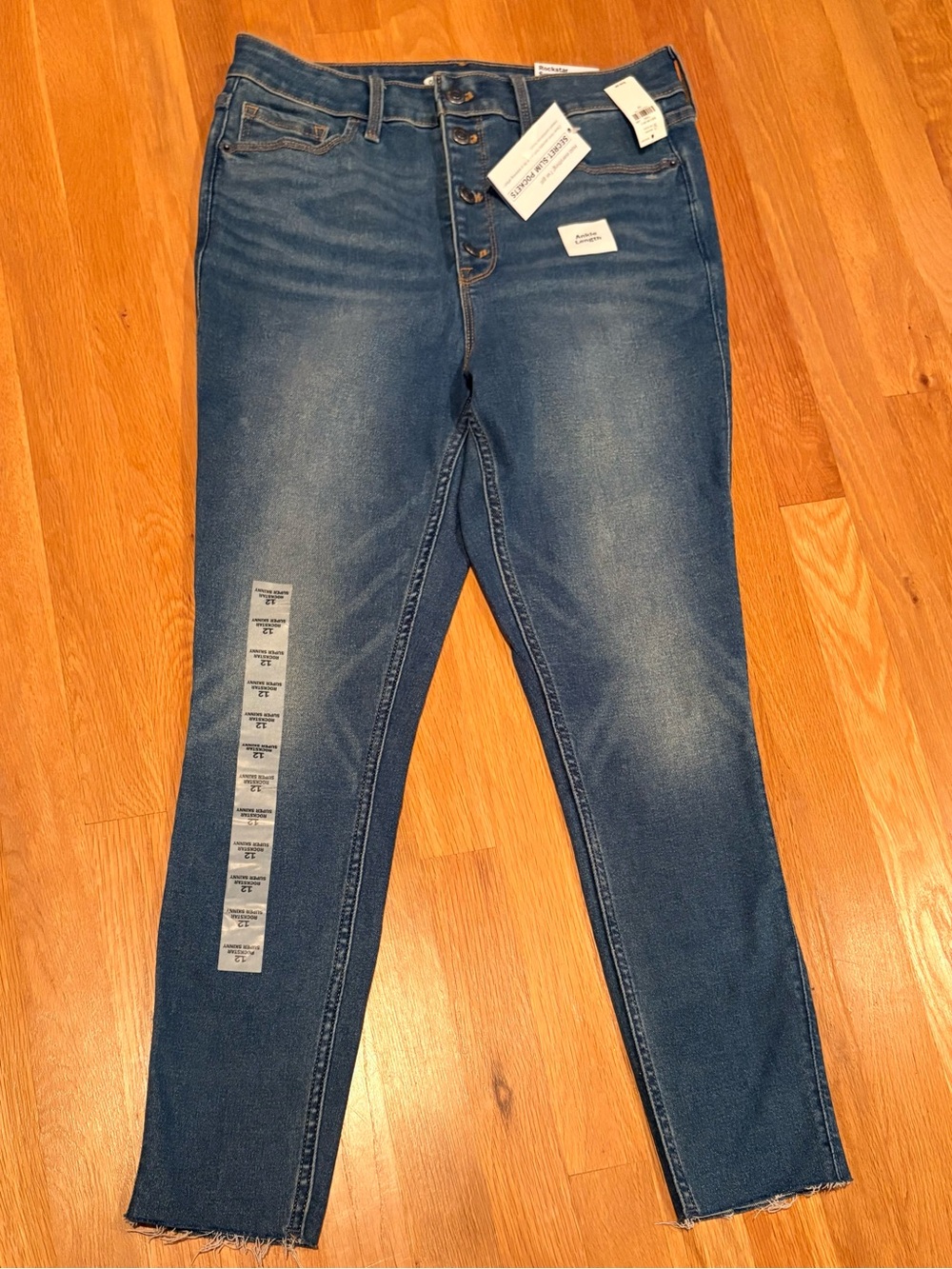 High-Rise Button-Fly Rock Star Womenβs Jeans - Medium Blue by Old Navy. NWT